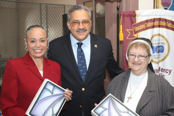 DMCA iPad Donation - Maria Guzman-Paczkowski, Michael D. Nieves, Sister Francis Marie Wystepek