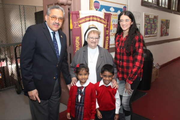 DMCA iPad Donation - Michael D. Nieves, Sister Francis Marie Wystepec, Daniela Nieves and children