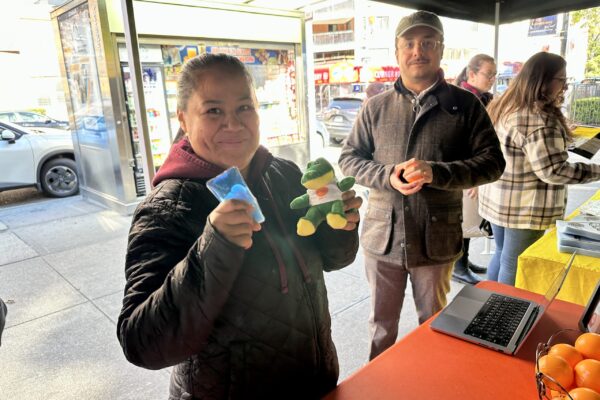 Health Fair Elmhurst Hospital_Lady Smiling with plushie