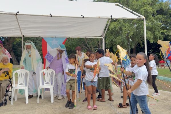 kids gathering with Ryes for pictures on stage_V2F_2026-01-07_13-17-46_363 Large