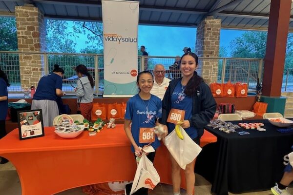 San Antonio Health Fair_Girls in front HITN table